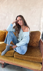 1️⃣ Sherry cardigan blauw wit gestreept dames
2️⃣ Zacht blauw wit gestreept vest onesize
3️⃣ Cardigan achterstevoren gedragen blauw wit
4️⃣ Sherry cardigan gecombineerd met jeans
