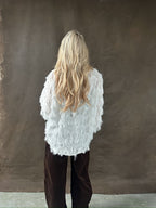 1️⃣ Noé blouse dames oversized
2️⃣ Vrolijke blouse met knopen feestelijk
3️⃣ Oversized blouse feest outfit
4️⃣ Noé blouse gecombineerd met pantalon
